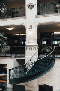 The architecture connecting the levels of Grove Arcade with the staircase