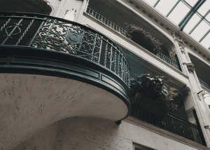 a photo looking up at one of the staircase and the plant features in the grove arcade.