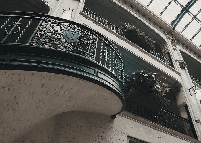 a photo looking up at one of the staircase and the plant features in the grove arcade.