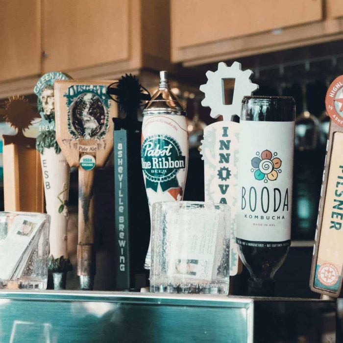 The different types of beer on tap at the bar at Carmel's