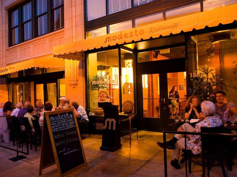 outdoor patio at modesto in grove arcade